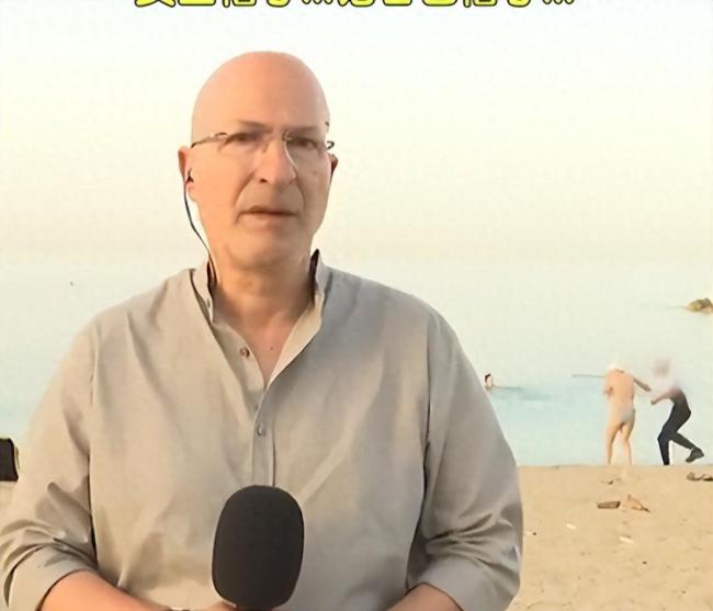 直播意外！希腊记者海滩直播中拍下惊魂一幕
